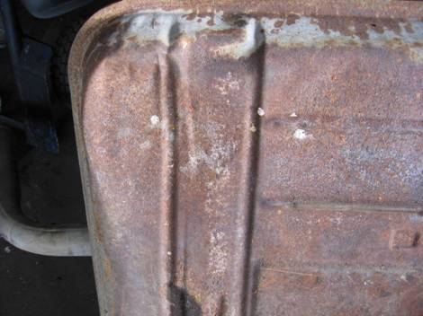 2. Showing dent in bottom of tank