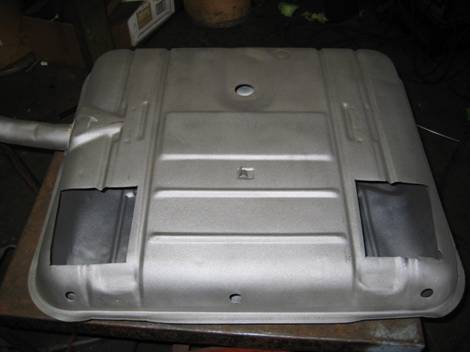 4. 100% of all dirt and rust have been removed after sandblasting and holes cut on top of tank for access to remove dents